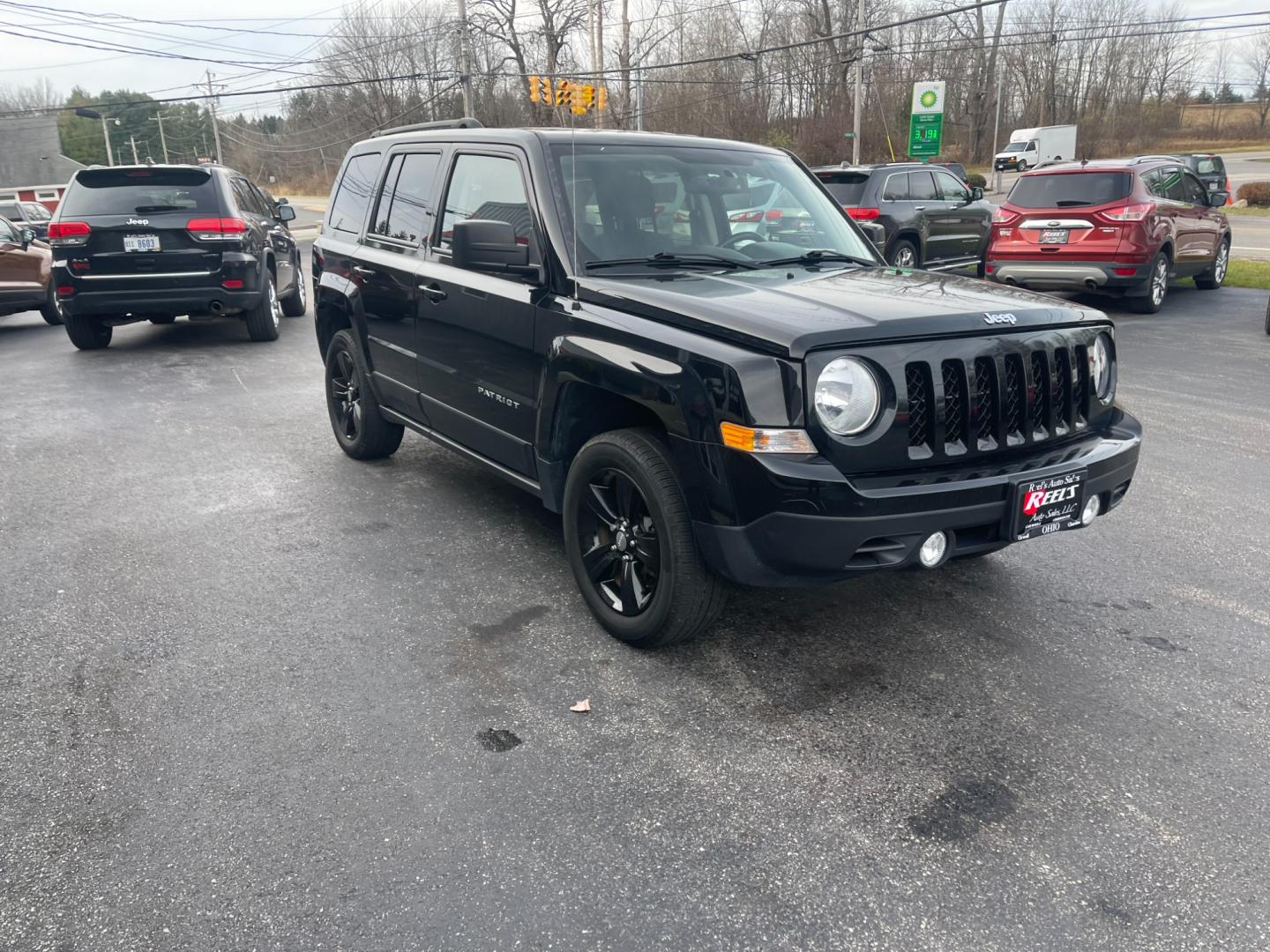 2017 Black /Black Jeep Patriot Latitude 4WD (1C4NJRFB5HD) with an 2.4L I4 DOHC 16V engine, 6-Speed Automatic transmission, located at 11115 Chardon Rd. , Chardon, OH, 44024, (440) 214-9705, 41.580246, -81.241943 - This 2017 Jeep Patriot Latitude with 4WD and only 55,000 miles on the odometer. This SUV comes equipped with a 2.4L engine for powerful performance. It features a comfortable and spacious interior with modern amenities. The 4WD capability ensures that you can handle any terrain or weather conditions - Photo#2